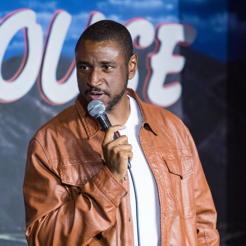 Karmel Humphrey on stage at a Cool Beans Comedy show.