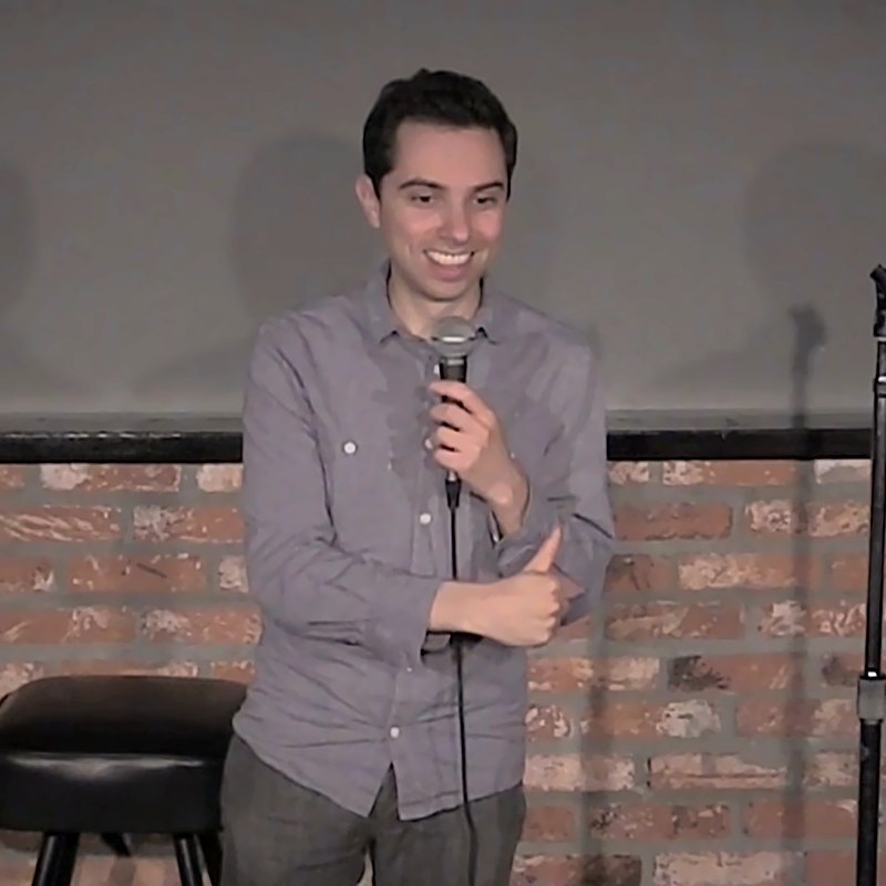 Matt Kirshen on stage at a Cool Beans Comedy show.